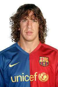 Carles Puyol -  Carles Puyol's full name is Carles Puyol Saforcada...... Puyol began his footballing career in yhe local team of small town where he was born, i.e., La Pobla de Segur....... At the age of seventeen, Puyol was signed up for Football Club of Barcelona's Academy at La Masia.......  Puyol rapidly became a fixture in Barcelona B team....... He then progressed to make his debut with the first team on October 2nd, 1999 against Valladolid....... Thanks to his determination to improve and a tremendous work rate, Carles Puyol adapted to the position of Central defender.......  In 2003-2004 season, he was chosen as the team's third captain....... In that season, Barcelona FC finished runners-up in the league......  However, Puyol had to wait until yhe 2004-2005 season for glory........ He was first chosen as the captain of the first team by Frank Rijkaard........ In that season, he saw his dream come true of lifting the league trophy in Nou Camp......  During the 2005-2006 season, Puyol led the team for a double which includes Spanish Primera Liga Championship and UEFA Champions League title.