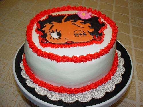 Betty Boop - White cake with buttercream icing. Betty Boop is done in the colorflow technique.