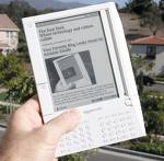 http://www.amazon.com/Kindle-Amazons-Wireless-Read - Picture of the Kindle, a ebook reading device created by owner of Amazon that you can read blogs, mags and newspapers on