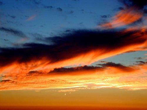 clouds - A view of clouds in a sunset. Look&#039;s like a different world isn&#039;t it.