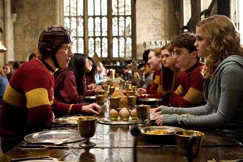 Breakfast in great hall - Ron Hermione and Harry can be seen in this still from harry Potter and the Half Blood Prince the upcoming movie in the series