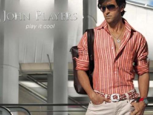 hritik roshan  - hritik roshan with goggles and maroonish shirt