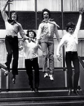 Pink Floyd early days - From left to right: Roger Waters, Nick Mason, Syd Barrett, Richard Wright. Leaping From the steps of EMI House in London.