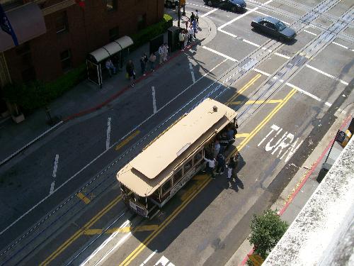 Cable Car - This is a photo of a cable car in San Francisco, California. It was taken from above when I was at the Fairmont Hotel. The Fairmont is located on Mason Street Atop Nob Hill. It is just gorgeous. A beautiful hotel.