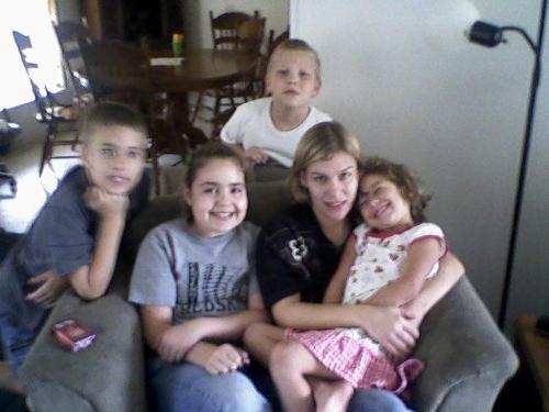 Rough family photo - This is my little family. The little girl (older) is the one that I have written many discussions about. She now gets to come over every other Saturday from 8am to 8pm. We have shared many tears over her having to go home when the time is up. I have 4 children altogether. The oldest is Enoch at 10. Eva is 9, Dakota is 7 and Alivia, the smallest, is 5. I was looking a little rough that day. I am preparing my yard for the colder seasons, and a fantastic Halloween party. I have lived for this moment for a while now. I would love for these times to go on and on. I am so blessed!