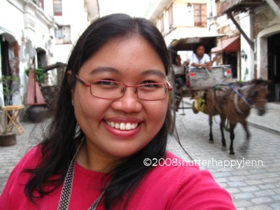 Jenn in Banaue, Ifugao - This is a self portrait of me in Calle Crisologo in Vigan, Ilocos Sur. I love the charm this street has, it's like walking back in time during the Spanish Era. Taken 28 May 2008 using my point and shoot camera.
