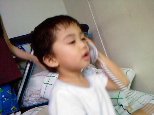 My Sid Talking on the Phone - Palm Tower Days at Makati. We live there for quite awahile. Maybe 2 or almost 3 years until we decided to move to the other side which is the east end in a bigger village for the kids to play. 