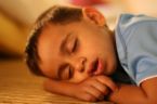 sleeping kid - a cute kid sleeping soundly. I think he should sleep in bed though for his health. :)