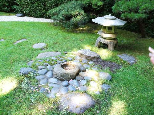 Stone Lantern - This is a picture of one of many Stone Lanterns inside the Japanese Tea Gardens which are located in Golden Gate Park, San Francisco, California. The history of the stone lantern began in the 6th century in Japan. They were used to light pathways to temples and shrines, which were lit by oil lamps placed inside these lanterns.