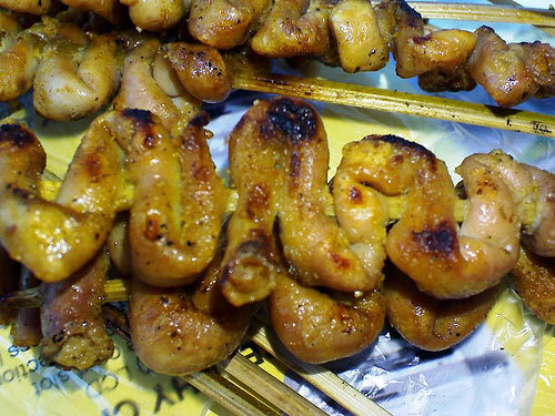 Chicken Intestine - This is one of the street foods here in the Philippines. Its called 'Isaw' or in other words Chicken Intestine. This particular food is one of the bizaare foods here but ut tastes really good especially mixed with Vinegar and chili.