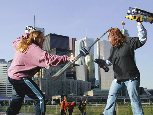 hobo vs ducky! - me and my friend taking on each other in toronto. tis a photoshop photo. she made it