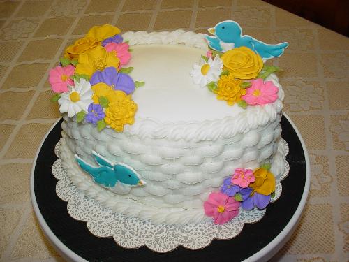 Wilton Course 2 Cake - This cake was done in my second Wilton course. The basketweave was quite a challenge. The flowers are all royal icing and the birds are colorflow.
