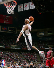 Dunk By Vince Carter - In this photo you can see the legend player Vince Carter rocking.. and heading towards a dunk...