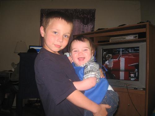 Two of the 3 men that have stole my heart - My grandson and son Willis That smile I can not resist!