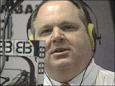 Picture of Rush Limbaugh - Picture of Rush Limbaugh behind a microphone