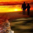 walking by the beach during sunset - its nice to walk by the beach during sunset. calms the nerves and just enjoying the refreshing solitude. though others would prefer to walk with someone, are you?