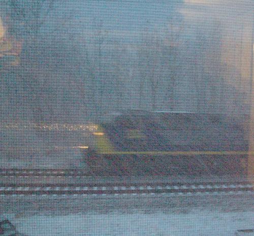 CSX freight in the snow - This pic was taken from my bedroom window. I love living near a RR track and love trains.
