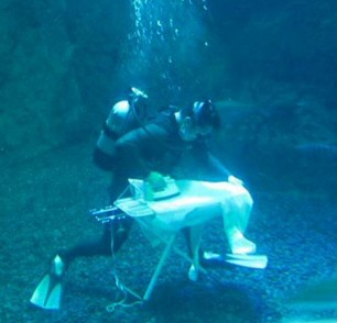 Ironing Under Water? - How about doing your ironing like this guy is doing? Of course he is doing this for a competition. A strangest place you have ironed competition.