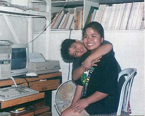 me and my youngest brother - this was taken after he was bugging me while i was doing something infront of the computer.
this was in 1995 i guess, he still was a baby then