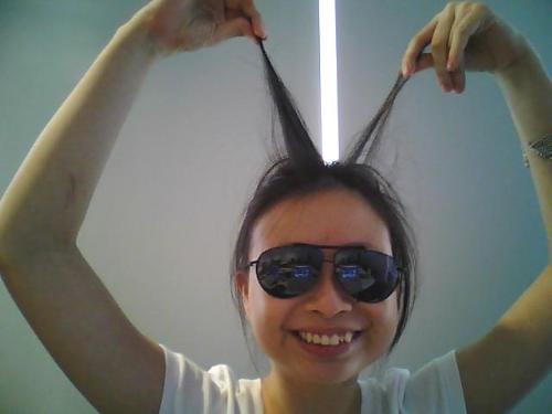 the bugs eye... - ok, so i am using my classmate's sun glasses, and made me look like a bug... lol... silly, i know....