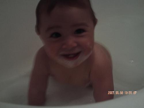 baby on bath - bath time but more likely playing time