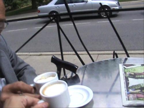 cheers!  - Espresso machiatos for two, please! This was taken the day after my husband came to Canada for his two week vacation. We had coffee at the Second Cup, a cafe we like up here.