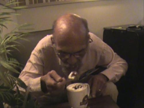 yummy!  - So cute! If one tries to drink a mocha latte without a spoon, that person is liable to get covered with whipped cream! :) Here is my husband discovering why I live at the Second Cup!