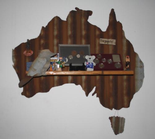 Australia - corigated Iron map of Australia with Australiana objects.