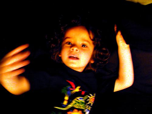 this pic came out trippy - Looks like a trippy tracer effect around my son's hand..lol