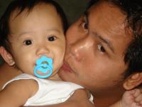 mu husband - this is a picture of my husband with my baby boy...:))