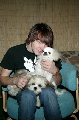Drake Bell, an Animal Lover - Drake Bell with his cute pets. Both are dogs. He surely is an animal lover. The dogs aren't cuter than him, for sure.