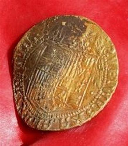 Treasure Found In Namibia - This is a coin found in a 500-year-old shipwreck off the southern coast of Namibia...