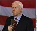 politics - This photo is John McCain against a backdrop of the American flag.