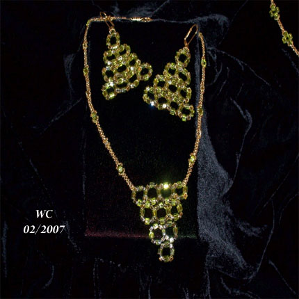 Simple things - This set was made with peridot green cube beads, smaller citrine cubes and gold seed beads. It is a very simple design, but worn with the right outfit, can look dressy.