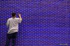 is he doodling? - when we were young,we love doodling on the wall,blackboard,and doors. that is how we express our idea of what we were thinking at that moment. but now it seems it is a not right thing to do in public place.
