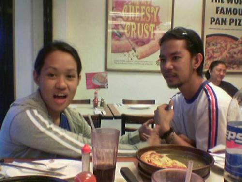 eating pizza - eating pizza at the hut