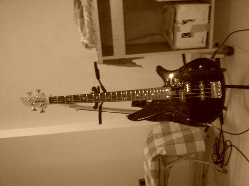 Bassy - My Black yamaha bass.My very first guitar.