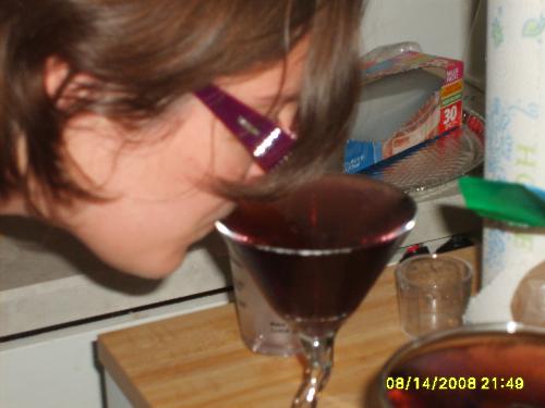 Grape Martini - Drinking a very full glass of a grape martini