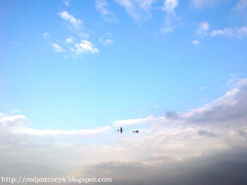 dangerously flying together - exhibit. making dangerous flips and turns, on air. this time, with twice the risk.