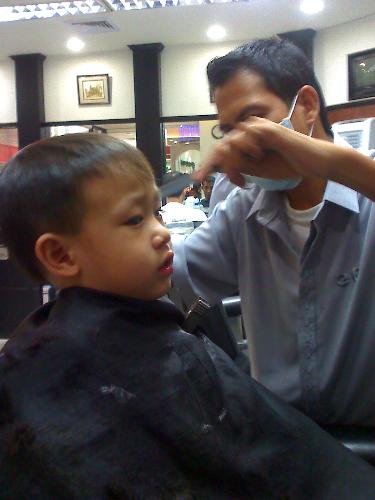 Barber shop - My second born, a barber cutting his hair