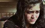 Sadness -  A picture of a girl looking sad.