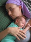 Mother and her baby -  A picture of a woman and her baby.