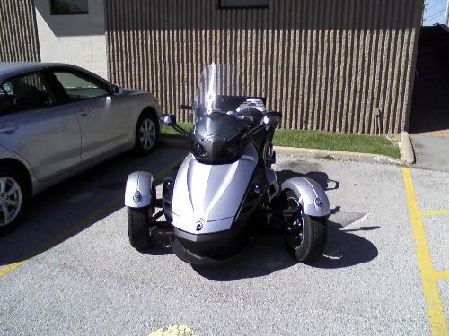 Motorcycle? - This is an odd sort of motorcycle I noticed over lunch today. It has three wheels, but two are in front and one in back. Interesting.