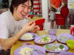 A man eating -  A picture of a man eating.