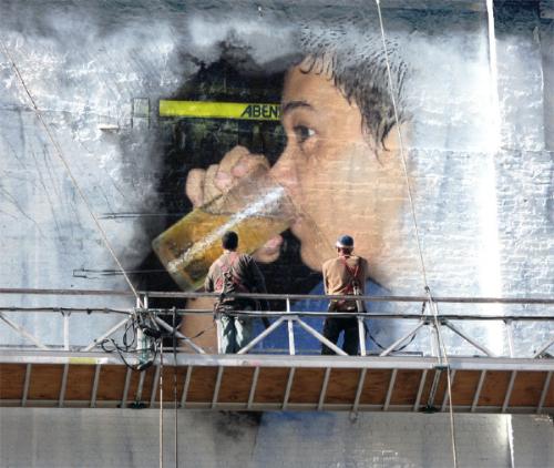 one photo on a building - i paid two people to paint my photo on a wall of a building.