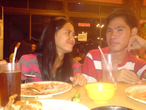 my brother - me and my brother, eating at the restaurant together with my siter.