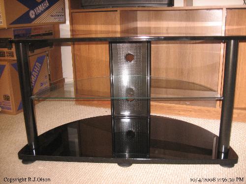 TV Stand - Only $99 at WalMart. Cheap but suitable for me in my living ropom. TV Stand - Only $99 at WalMart. Cheap but suitable for me in my living ropom.