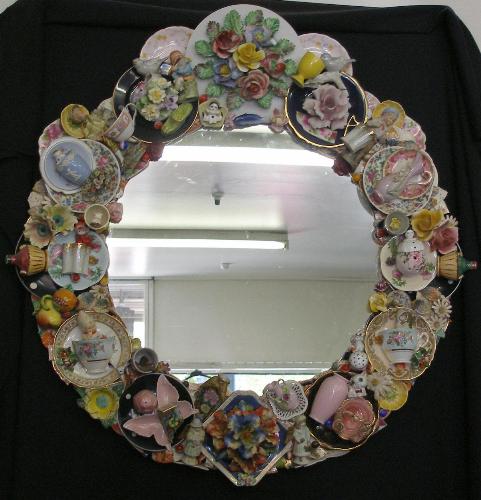 Decorated Mirror - decorated mirror of broken plates and cups..