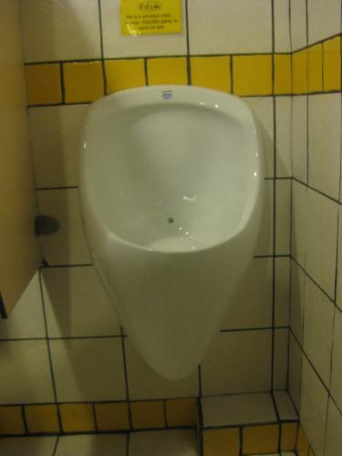 water saving urinal - man it saves 150,000 gallons of water per year. pretty cool eh?