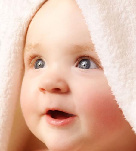 Baby - Isn't he Cute? My wife is pregnant and this is the photo that I have pasted in front of our bed.